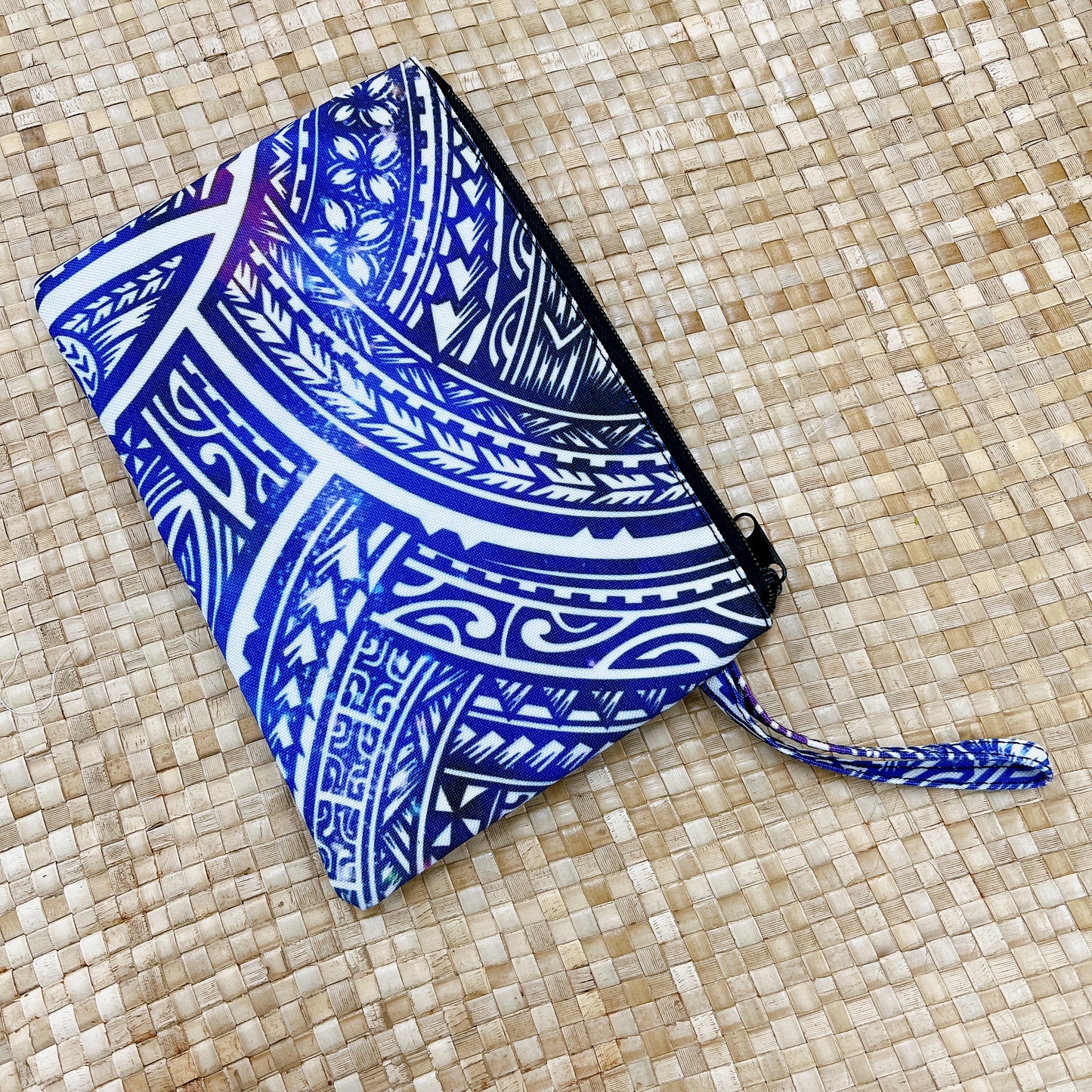 Polynesian pattern clutch bag