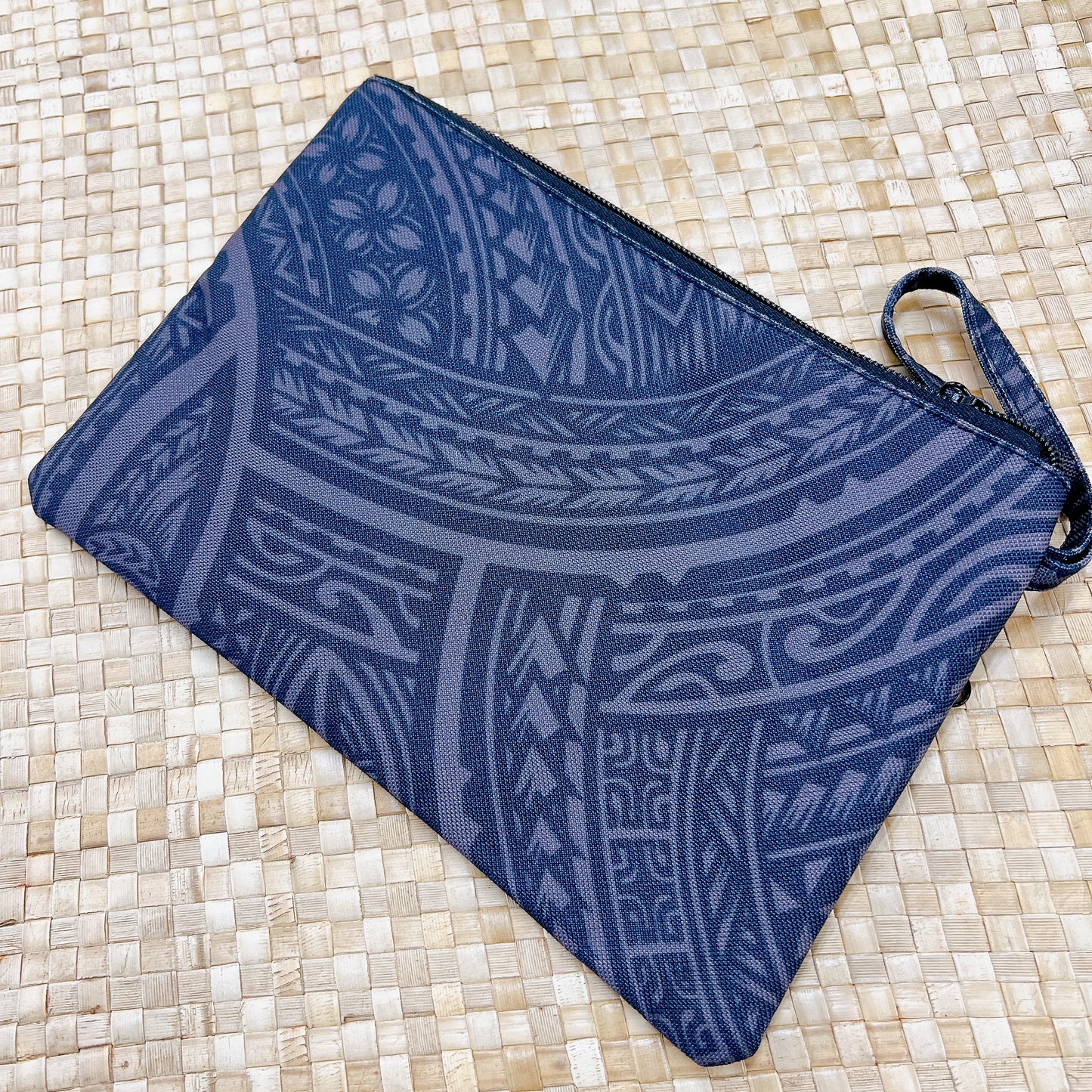 Polynesian pattern clutch bag