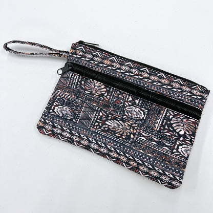 Polynesian pattern clutch bag