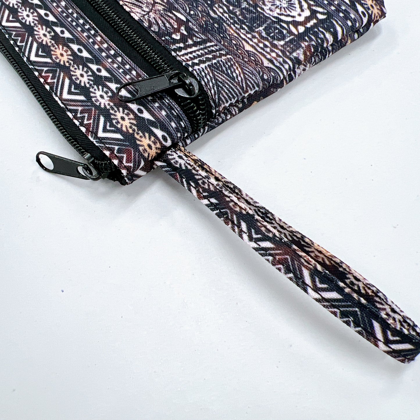Polynesian pattern clutch bag