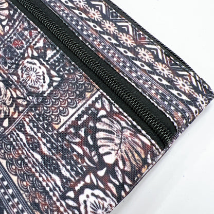 Polynesian pattern clutch bag